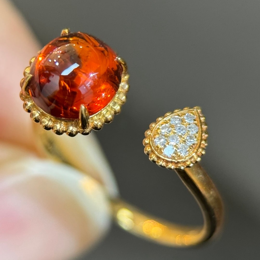 14k Gold 2.63 Ctw Natural Spessartine & Diamond Ring: Ref:231108080 // gold content:14k gold // ring size:7. 25us // // main gemstone:spessartine // shape:oval // carat weight:2. 55ct // color:orange // treatment:natural // // adjacent gemstone 2 :