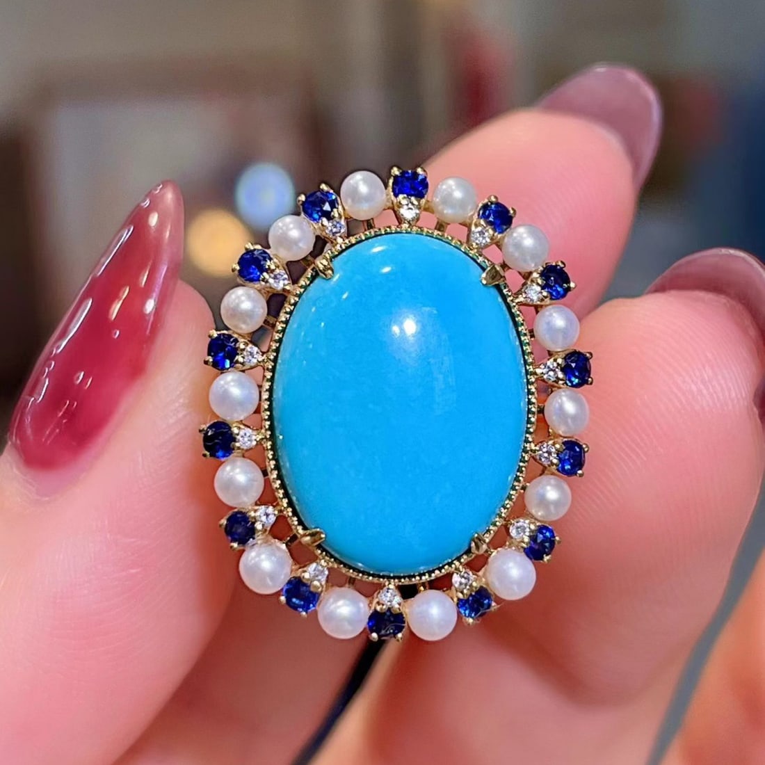 14k Gold 6.80 Ctw Natural Blue Turquoise & Sapphire Ring: Ref:231108115 // gold content:14k gold // ring size:7. 25us // // main gemstone:blue turquoise // shape:oval // carat weight:6. 43ct // color:blue // treatment:natural // // adjacent gemstone 2 :
