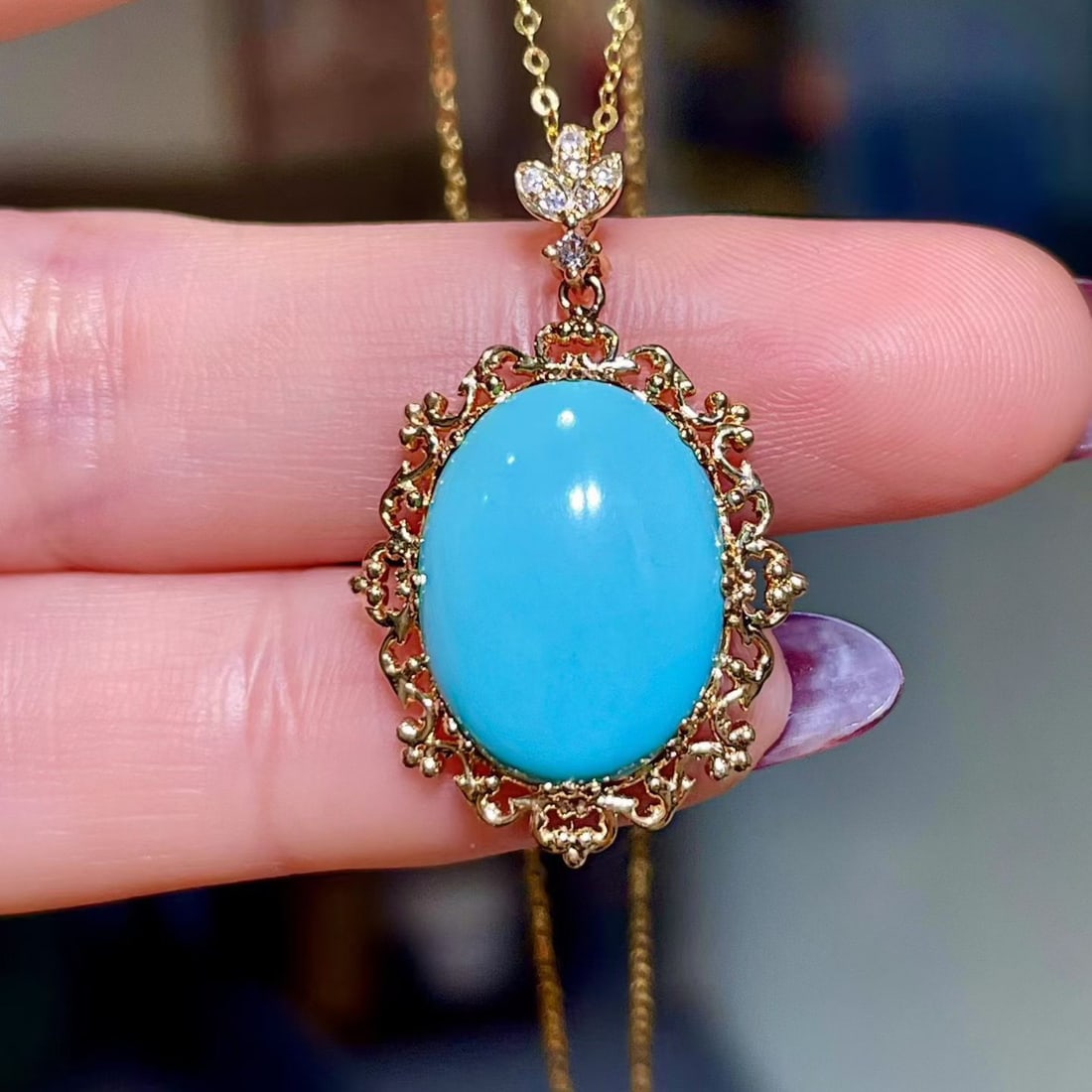 14k Gold 6.29 Ctw Natural Blue Turquoise & Diamond Pendant( Without Chain ): Ref:231108131 // gold content:14k gold // main gemstone:blue turquoise // shape:oval // carat weight:6. 25ct // color:blue // treatment:natural // // adjacent gemstone 2 : diamond // shape:round //
