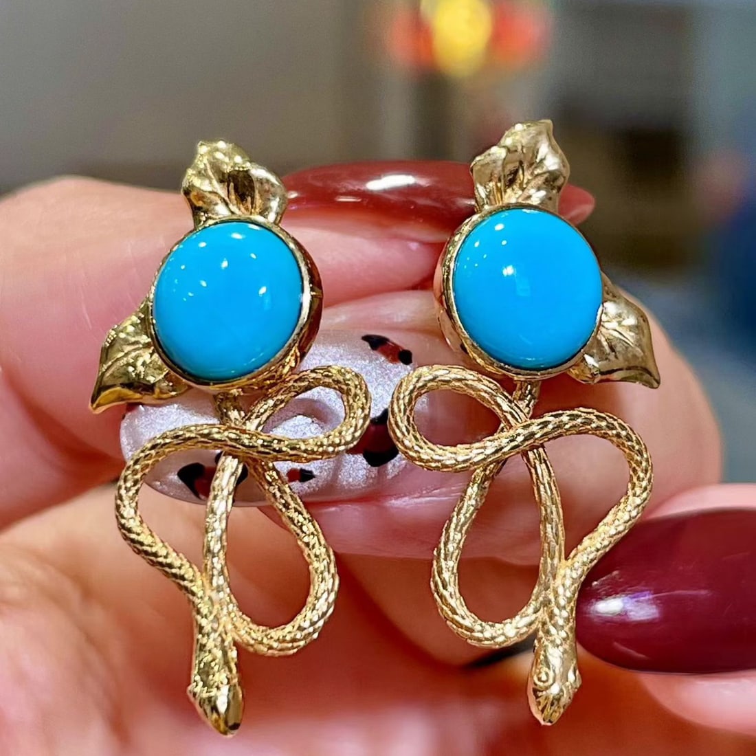 14k Gold 3.98 Ct Natural Blue Turquoise Earrings: Ref:231108148 // gold content:14k gold // main gemstone:blue turquoise // shape:round // carat weight:3. 98ct // color:blue // treatment:natural // cut grade:g // High Estimate: 5300 Low Estimate:
