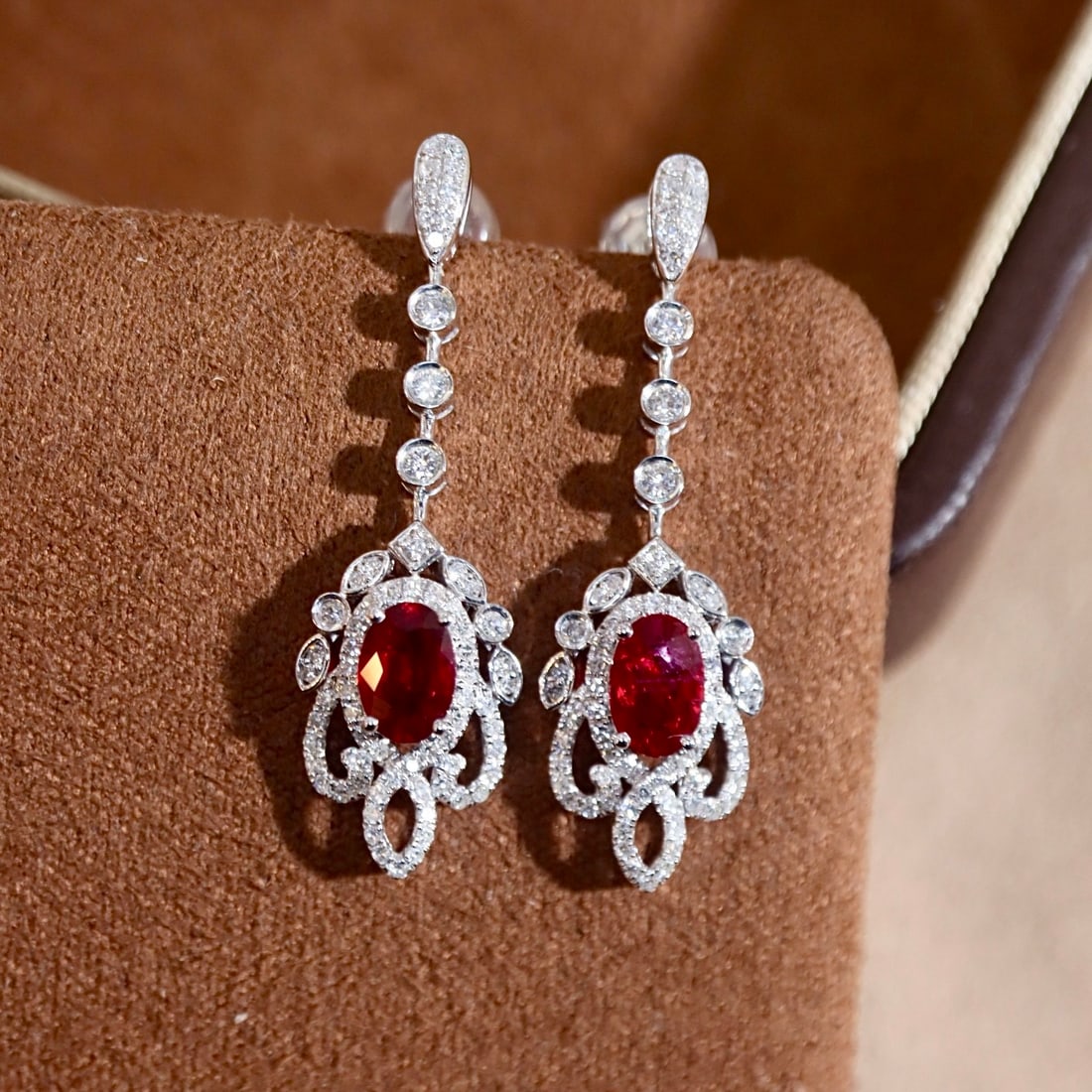 14k Gold 1.60 Ctw Natural Ruby & Diamond Earrings: Ref:231108192 // gold content:14k gold // main gemstone:ruby // shape:oval // carat weight:1. 20ct // color:red // treatment:natural // // adjacent gemstone 2 : diamond // shape:round // carat weight: