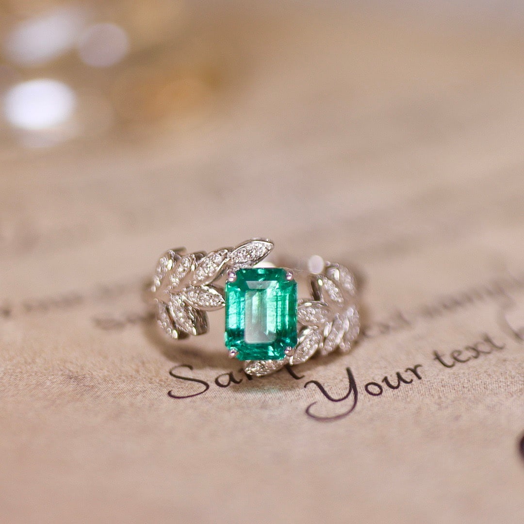 14k Gold 1.48 Ctw Natural Emerald & Diamond Ring: Ref:231108210 // gold content:14k gold // ring size:7. 25us // // main gemstone:emerald // shape:octagonal // carat weight:1. 33ct // color:green // treatment:natural // // adjacent gemstone 2 :