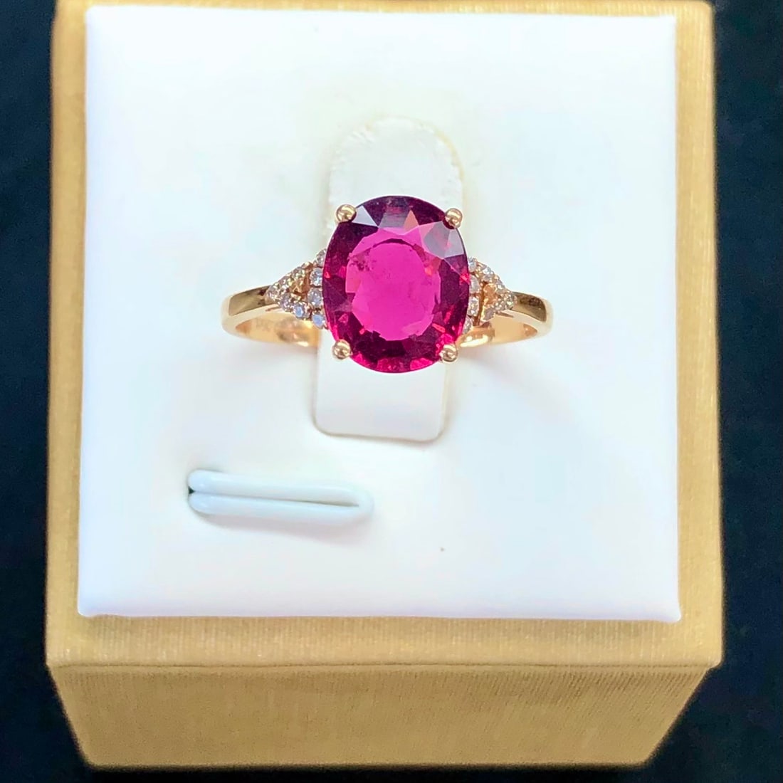 14k Gold 2.34 Ctw Natural Tourmaline & Diamond Ring: Ref:231108213 // gold content:14k gold // ring size:7. 25us // // main gemstone:tourmaline // shape:oval // carat weight:2. 26ct // color:red // treatment:natural // // adjacent gemstone 2 : diamond