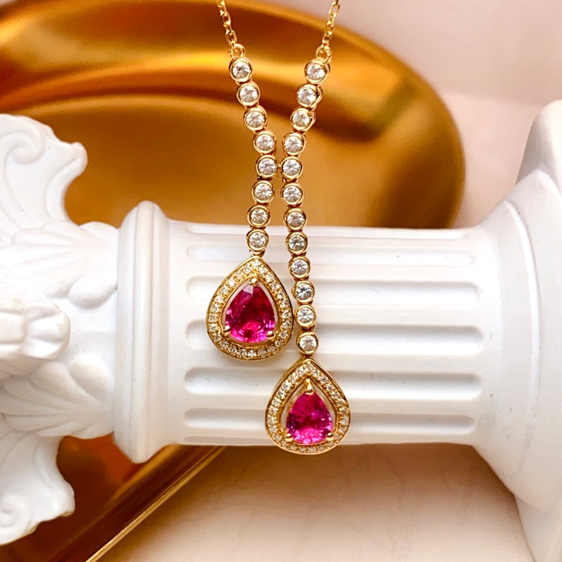 14k Gold 1.00 Ct Natural Ruby & Diamond & Sapphire Necklace: Ref:231108274 // gold content:14k gold // main gemstone:ruby // shape:pear // carat weight:1. 00ct // color:red // treatment:natural // // adjacent gemstone 2 : diamond // number of stones:48 //