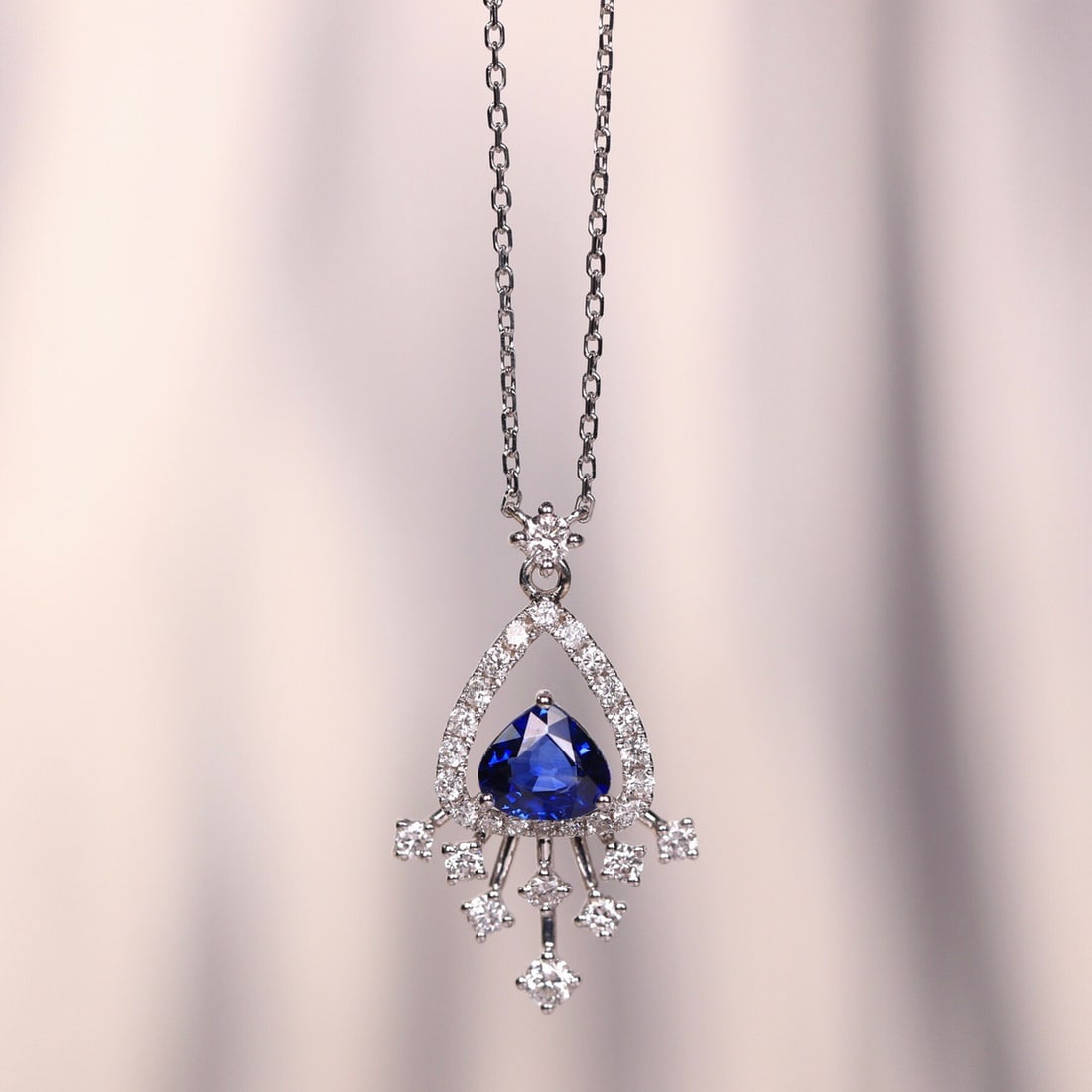 14k Gold 0.69 Ct Natural Sapphire & Diamond Necklace: Ref:231108337 // gold content:14k gold // main gemstone:sapphire // shape:pear // carat weight:0. 69ct // color:blue // treatment:natural // // adjacent gemstone 2 : diamond // shape:round // clarity