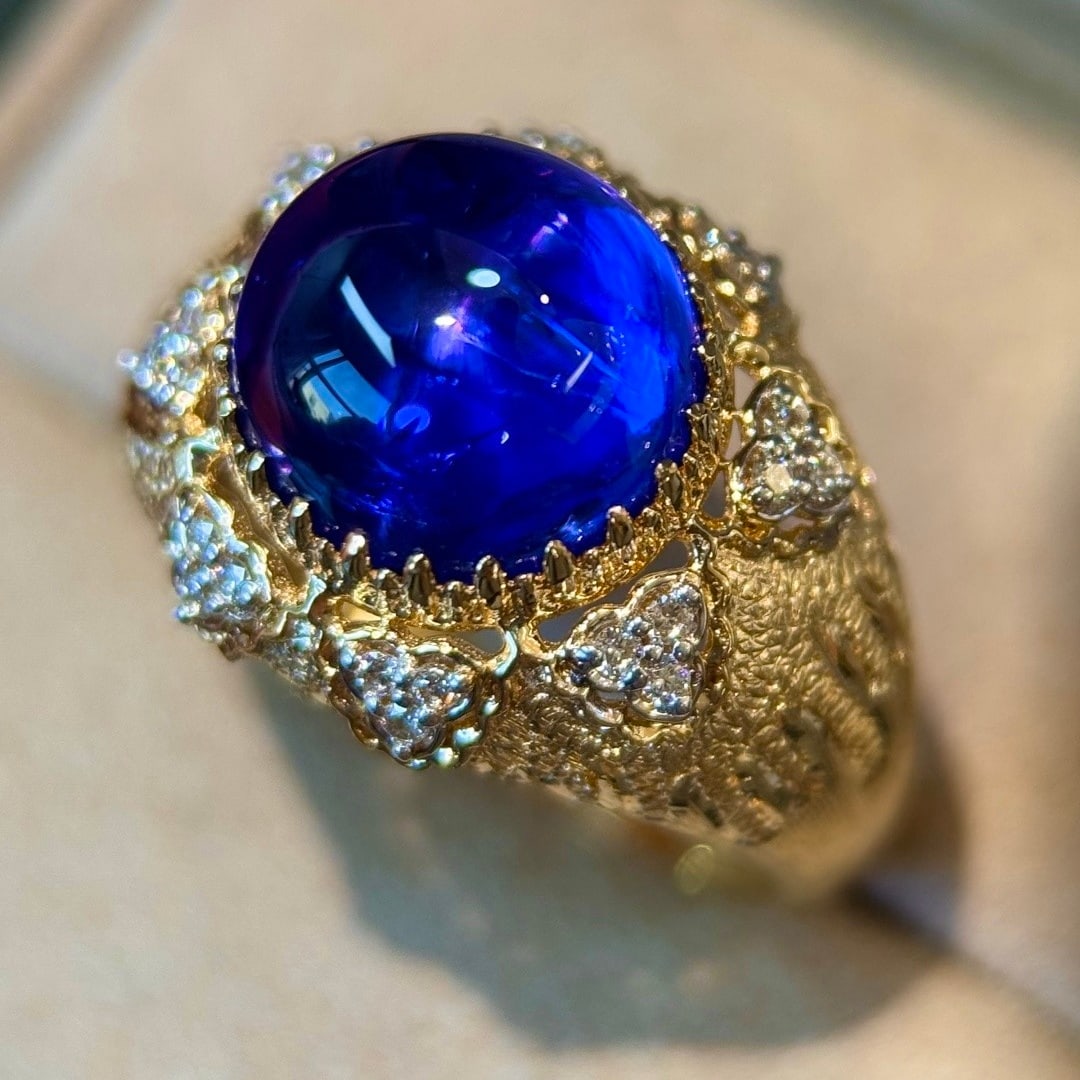 14k Gold 6.32 Ct Natural Tanzanite & Diamond Ring: Ref:231108360 // gold content:14k gold // ring size:7. 25us // // main gemstone:tanzanite // shape:round // carat weight:6. 32ct // color:blue // treatment:natural // cut grade:g // // adjacent
