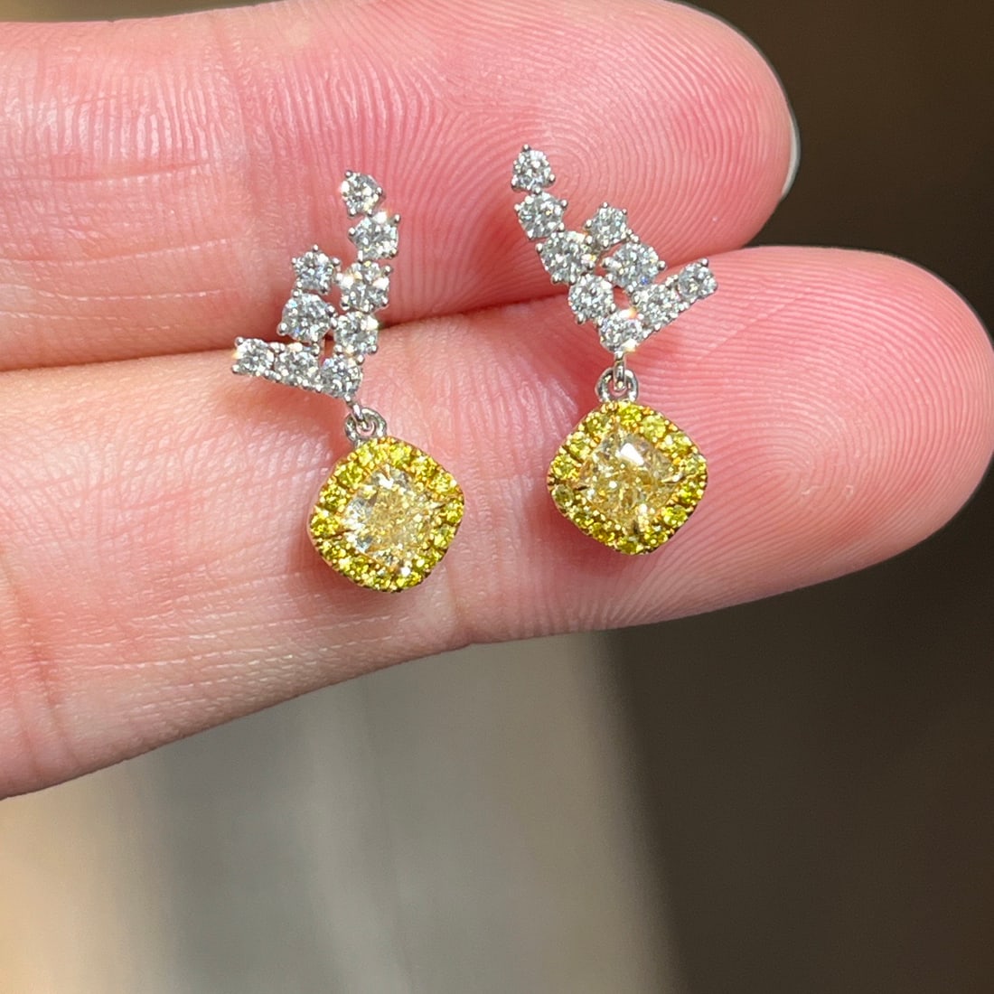 14k Gold 0.6 Ct Natural Yellow Diamond & Diamond Earrings: Ref:231108367 // gold content:14k gold // main gemstone:yellow diamond // shape:cushion // carat weight:0. 6ct // color:yellow // treatment:natural // // adjacent gemstone 2 : diamond // shape:round