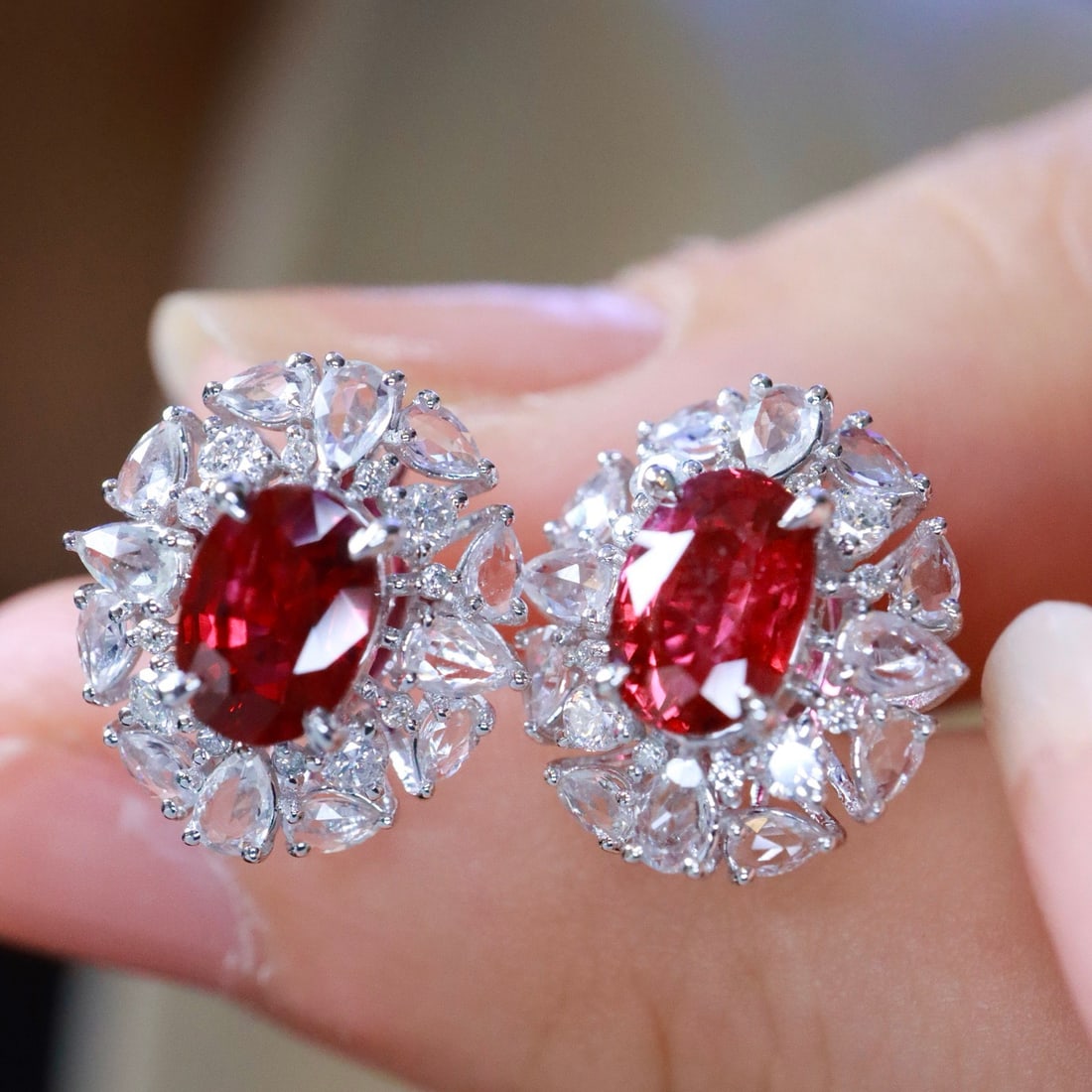 14k Gold 2.32 Ctw Natural Ruby & Sapphire Earrings: Ref:231108375 // gold content:14k gold // main gemstone:ruby // shape:oval // carat weight:1. 67ct // color:pigeonblood red // treatment:natural // // adjacent gemstone 2 : sapphire // shape:pear //