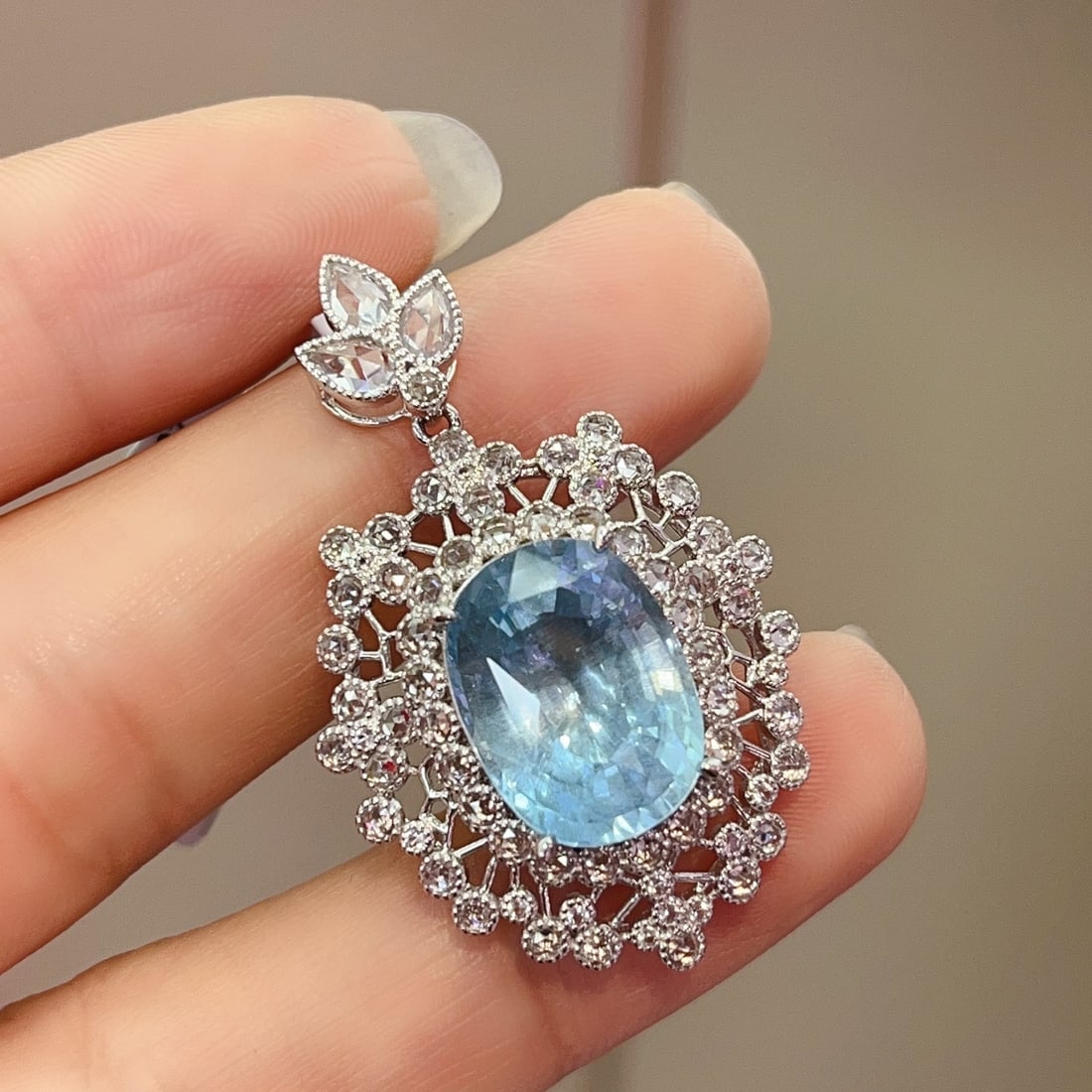 14k Gold 7.50 Ct Natural Aquamarine & Sapphire Pendant( Without Chain ): Ref:231108380 // gold content:14k gold // main gemstone:aquamarine // shape:oval // carat weight:7. 50ct // color:blue // treatment:natural // // adjacent gemstone 2 : sapphire // number of stones:74 