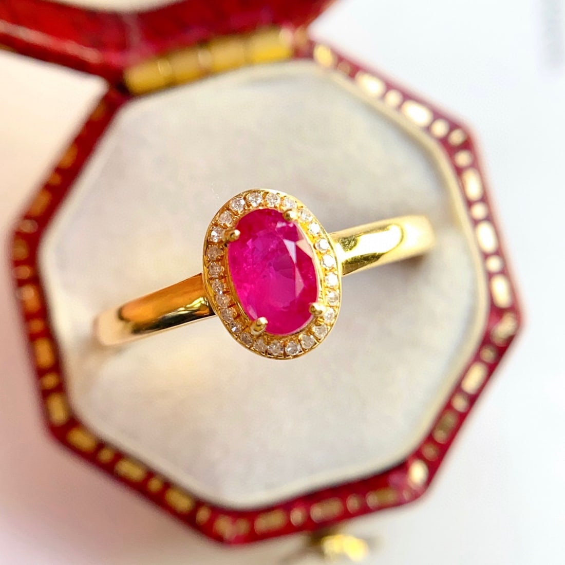 14k Gold 0.68 Ct Natural Ruby & Diamond Ring: Ref:231108394 // gold content:14k gold // ring size:7. 25us // // main gemstone:ruby // shape:oval // carat weight:0. 68ct // color:red // treatment:natural // // adjacent gemstone 2 : diamond //