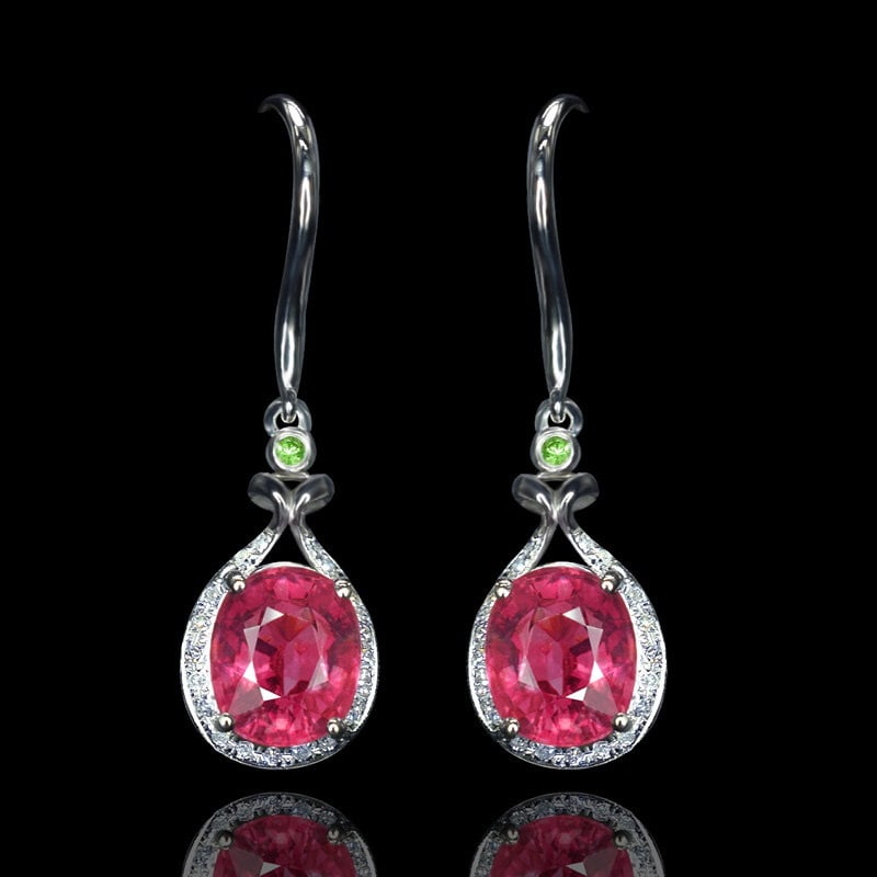14k Gold 3.48 Ctw Natural Tourmaline & Tsavorite Earrings: Ref:231111054 // gold content:14k gold // main gemstone:tourmaline // shape:oval // carat weight:3. 45ct // color:red // treatment:natural // // adjacent gemstone 2 : tsavorite // shape:round //