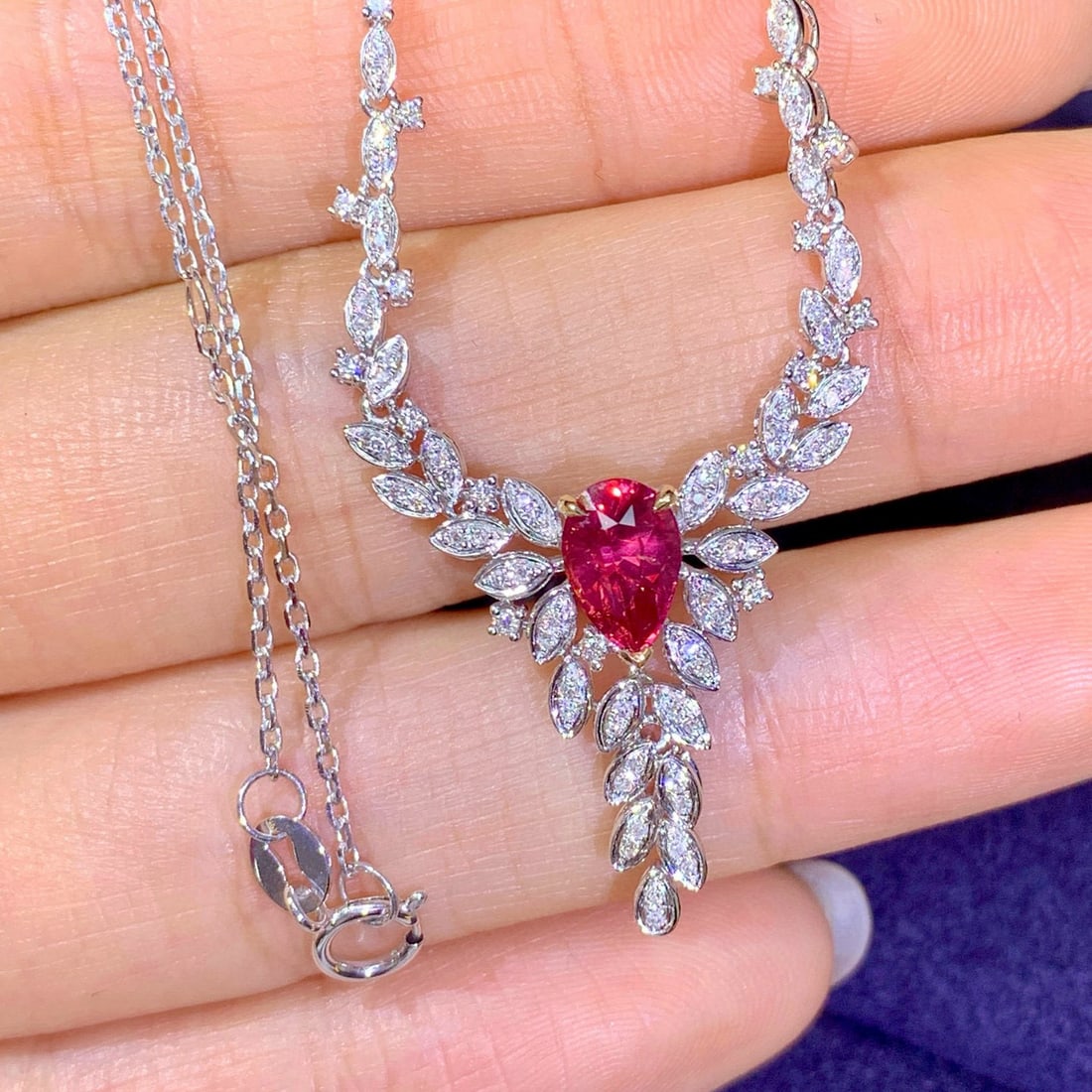 14k Gold 1.40 Ctw Natural Ruby & Diamond Necklace: Ref:231111070 // gold content:14k gold // main gemstone:ruby // shape:pear // carat weight:1. 12ct // color:red // treatment:natural // // adjacent gemstone 2 : diamond // number of stones:83 //