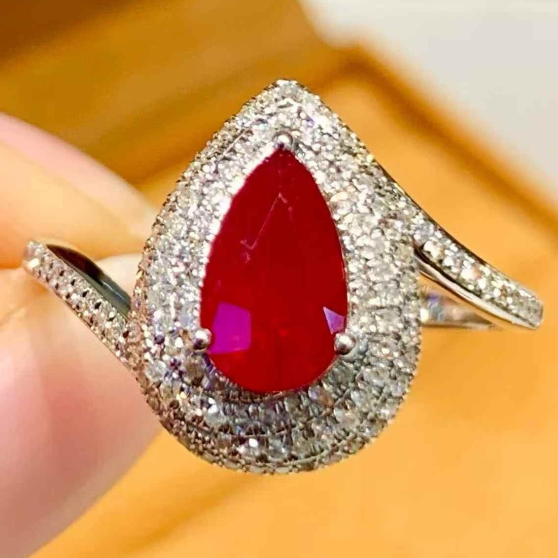 14k Gold 1.1 Ct Natural Ruby & Diamond Ring: Ref:231111151 // gold content:14k gold // ring size:7. 25us // // main gemstone:ruby // shape:pear // carat weight:1. 1ct // color:red // treatment:natural // // adjacent gemstone 2 : diamond //