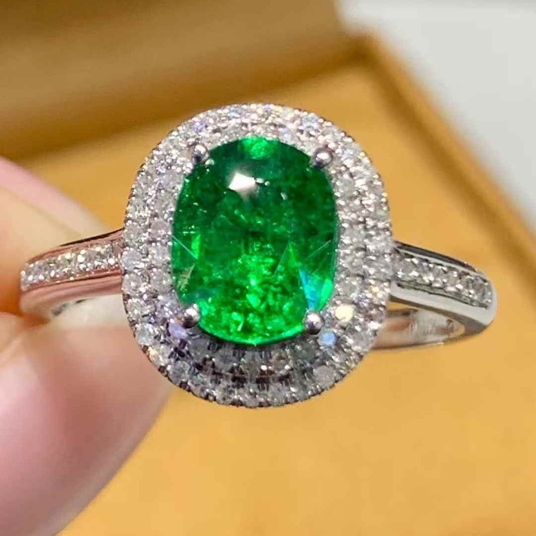 14k Gold 1.55 Ct Vivid Green Natural Tsavorite & Diamond Ring: Ref:231111173 // gold content:14k gold // ring size:7. 25us // // main gemstone:tsavorite // shape:oval // carat weight:1. 55ct // color:vivid green // treatment:natural // // adjacent gemstone 2 :