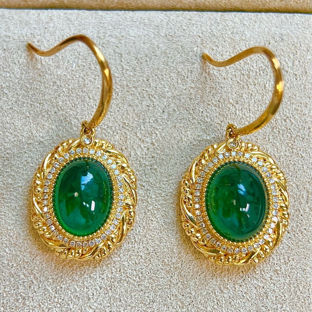 14k Gold 5.94 Ctw Vivid Green Natural Emerald & Diamond Earrings: Ref:231111194 // gold content:14k gold // main gemstone:emerald // shape:oval // carat weight:5. 66ct // color:vivid green // treatment:natural // // adjacent gemstone 2 : diamond // shape:round //