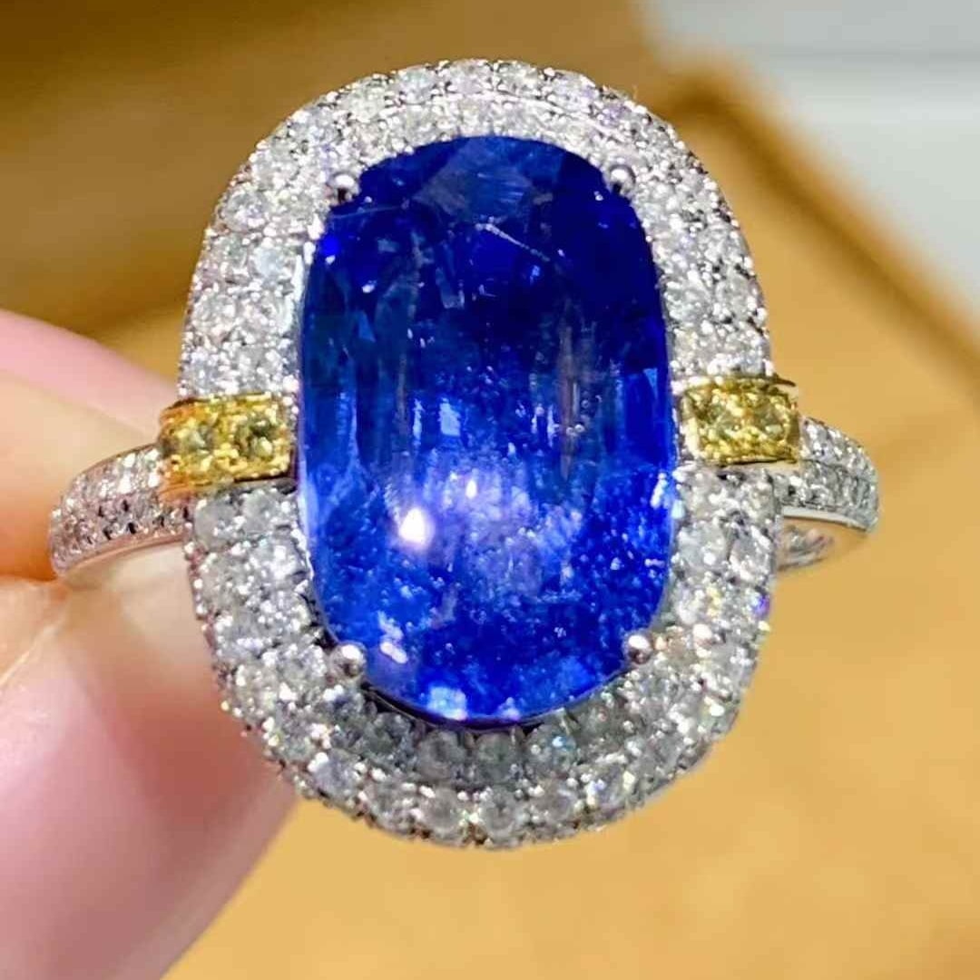 14k Gold 4.1 Ct Natural Sapphire & Diamond Ring: Ref:231111244 // gold content:14k gold // ring size:7. 25us // // main gemstone:sapphire // shape:oval // carat weight:4. 1ct // color:blue // treatment:natural // // adjacent gemstone 2 : diamond //
