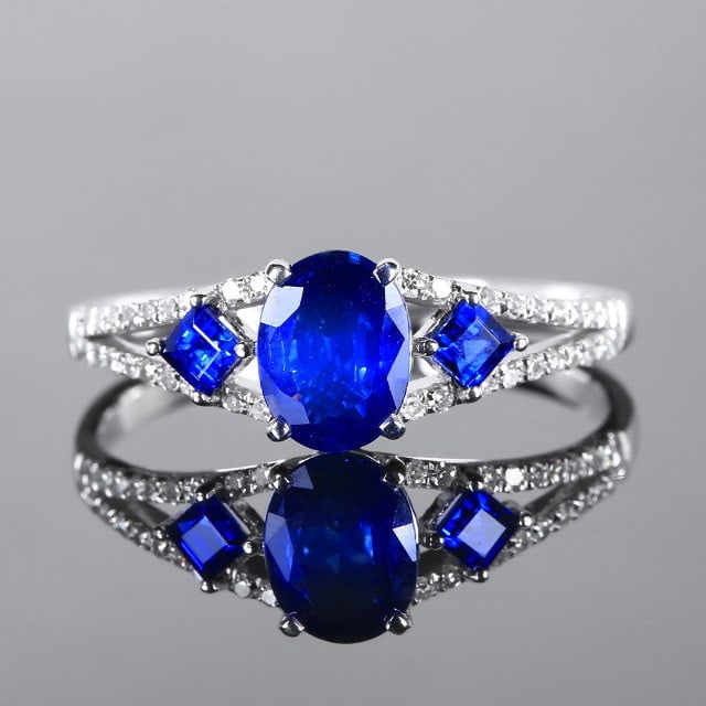 14k Gold 1.02 Ctw Natural Sapphire & Sapphire Ring: Ref:231111245 // gold content:14k gold // ring size:7. 25us // // main gemstone:sapphire // shape:oval // carat weight:0. 77ct // color:royal blue // treatment:natural // // adjacent gemstone 2 :