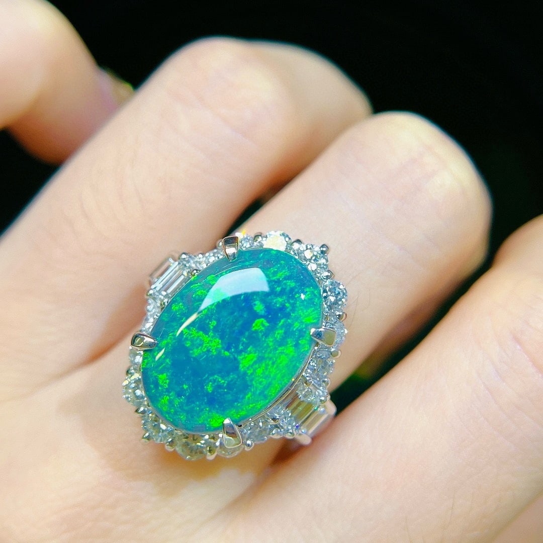 14k Gold 9.63 Ctw Natural Opal & Diamond Ring: Ref:231111250 // gold content:14k gold // ring size:7. 25us // // main gemstone:opal // shape:oval // carat weight:7. 75ct // color:color // treatment:natural // // adjacent gemstone 2 : diamond // sh