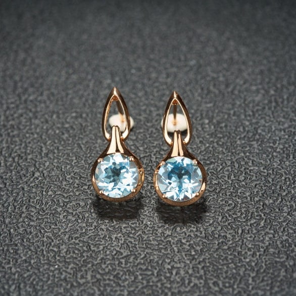 14k Gold 3.19 Ct Natural Aquamarine Earrings: Ref:231112033 // gold content:14k gold // main gemstone:aquamarine // shape:round // carat weight:3. 19ct // color:blue // treatment:natural // cut grade:g // Condition: New Low Estimate: 3100.00
