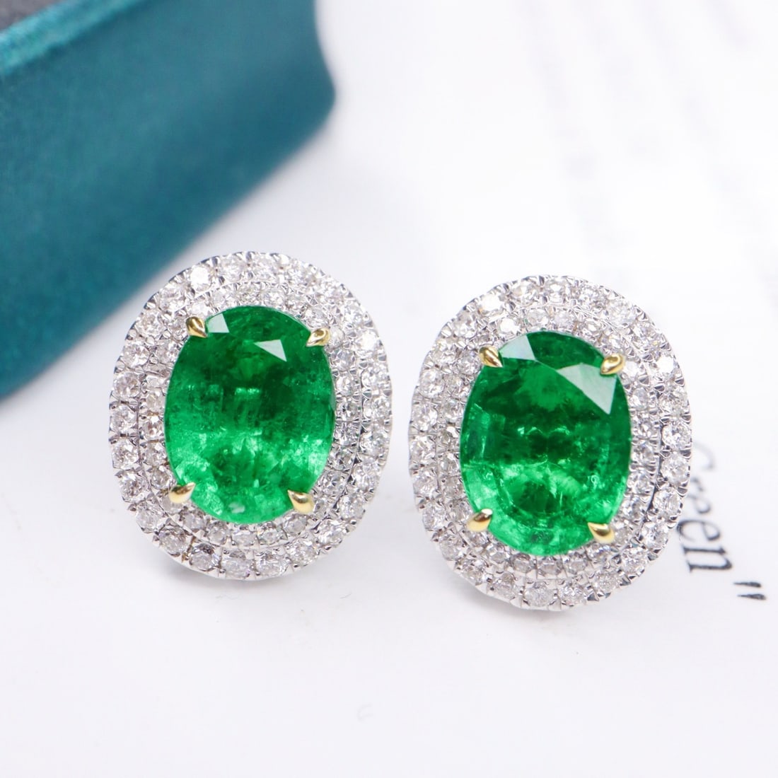 14k Gold 4.48 Ctw Vivid Green Natural Emerald & Diamond Earrings: Ref:231112035 // gold content:14k gold // main gemstone:emerald // shape:oval // carat weight:3. 7ct // color:vivid green // treatment:natural // // adjacent gemstone 2 : diamond // shape:round // car