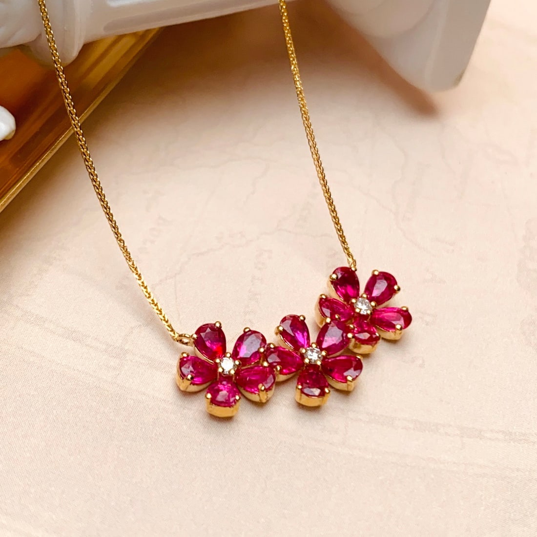 14k Gold 2.50 Ct Natural Ruby & Diamond Necklace: Ref:231112059 // gold content:14k gold // main gemstone:ruby // shape:pear // carat weight:2. 50ct // color:red // treatment:natural // // adjacent gemstone 2 : diamond // number of stones:3 //