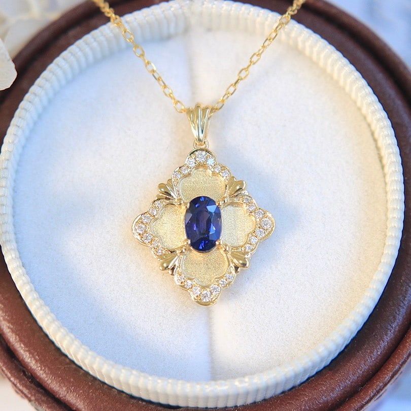 14k Gold 0.7 Ct Natural Sapphire & Diamond Pendant( Without Chain ): Ref:231112060 // gold content:14k gold // main gemstone:sapphire // shape:oval // carat weight:0. 7ct // color:blue // treatment:natural // // adjacent gemstone 2 : diamond // shape:round // clarity