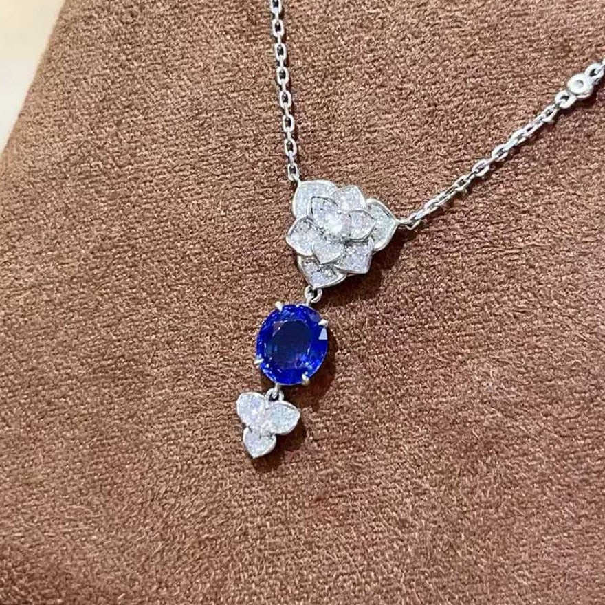 14k Gold 1.32 Ctw Natural Sapphire & Diamond Necklace: Ref:231112090 // gold content:14k gold // main gemstone:sapphire // shape:oval // carat weight:1. 09ct // color:blue // treatment:natural // // adjacent gemstone 2 : diamond // shape:round // carat