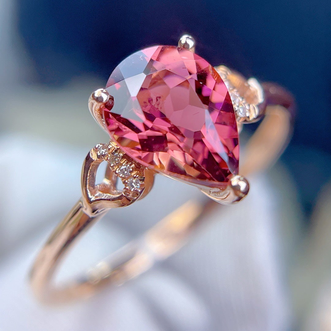 14k Gold 1.6 Ct Natural Tourmaline & Diamond Ring: Ref:231112097 // gold content:14k gold // ring size:7. 25us // // main gemstone:tourmaline // shape:pear // carat weight:1. 6ct // color:red // treatment:natural // // adjacent gemstone 2 : diamond