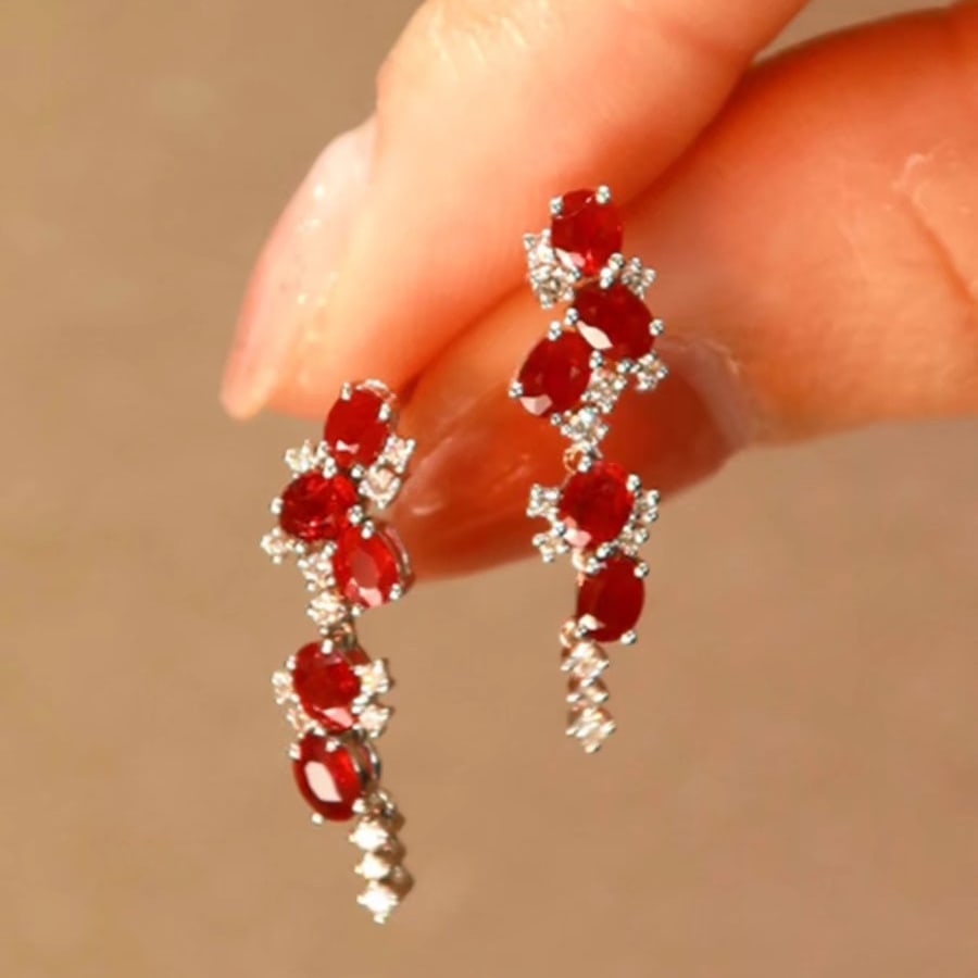 14k Gold 2 Ct Vivid Red Natural Ruby & Diamond Earrings: Ref:231112100 // gold content:14k gold // main gemstone:ruby // shape:oval // carat weight:2ct // color:vivid red // treatment:natural // // adjacent gemstone 2 : diamond // shape:round // clarity