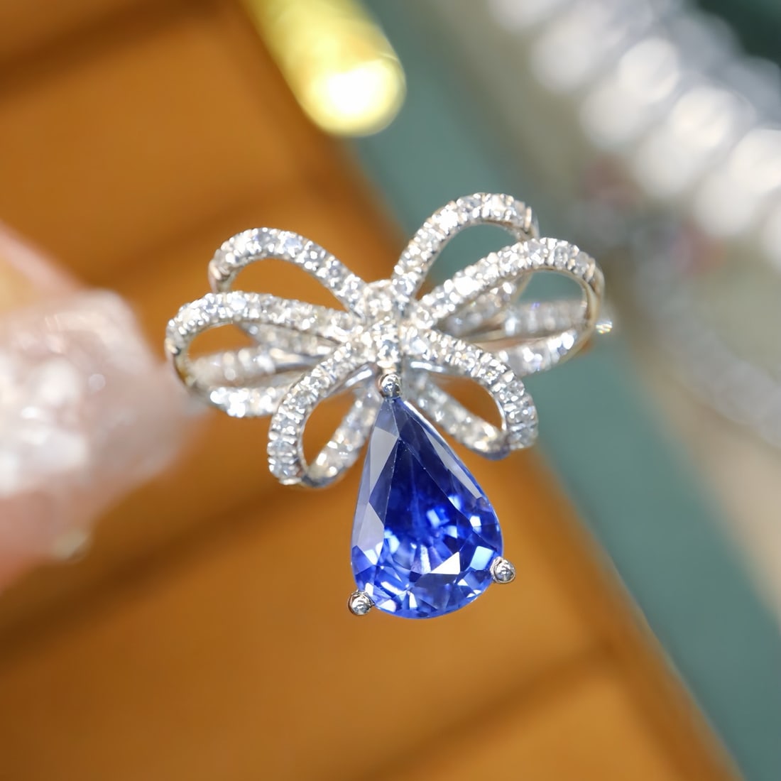 14k Gold 1.62 Ctw Natural Sapphire & Diamond Ring: Ref:231112120 // gold content:14k gold // ring size:7. 25us // // main gemstone:sapphire // shape:pear // carat weight:1. 38ct // color:cornflower blue // treatment:natural // // adjacent gemstone 2