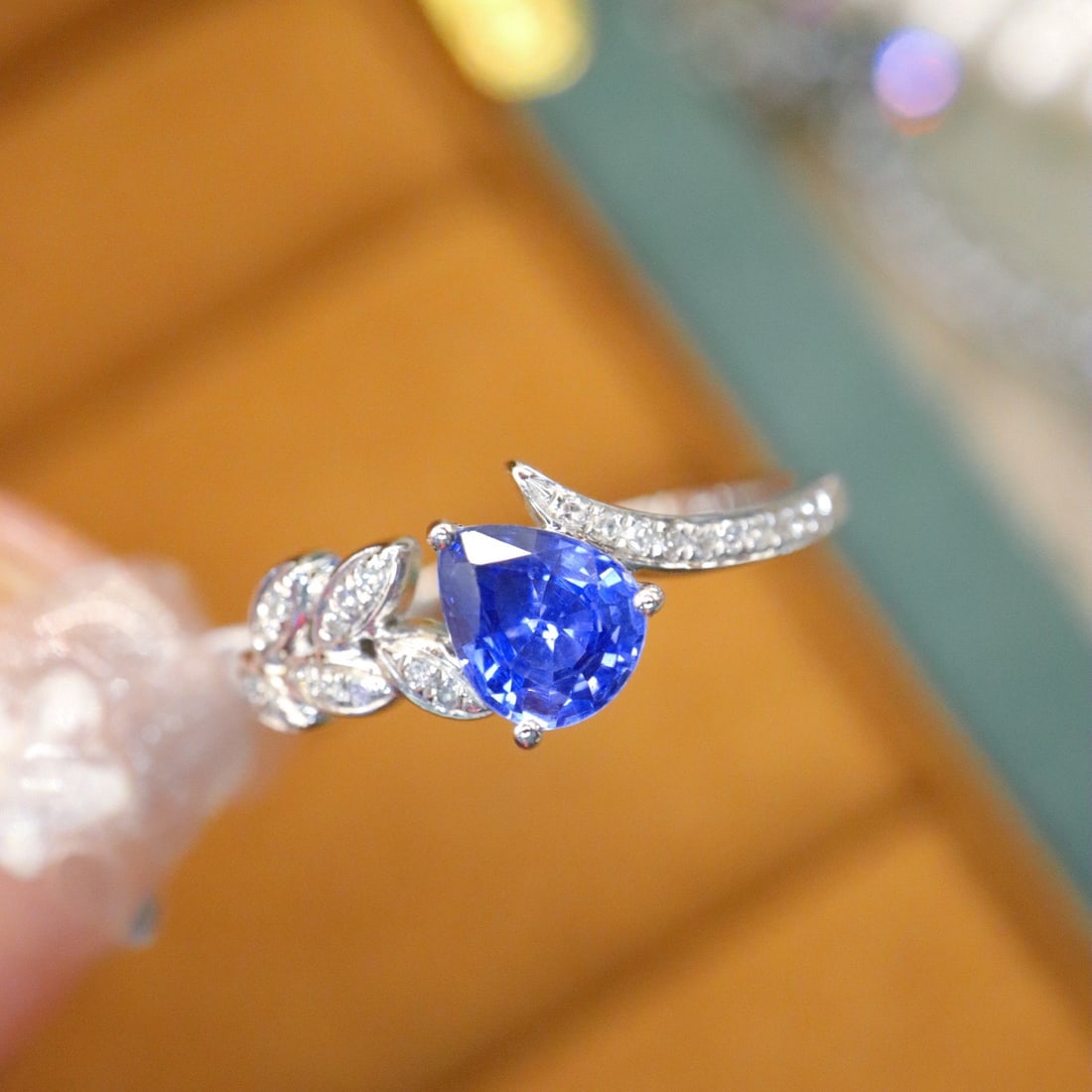 14k Gold 0.82 Ctw Natural Sapphire & Diamond Ring: Ref:231112134 // gold content:14k gold // ring size:7. 25us // // main gemstone:sapphire // shape:pear // carat weight:0. 76ct // color:blue // treatment:natural // // adjacent gemstone 2 : diamond