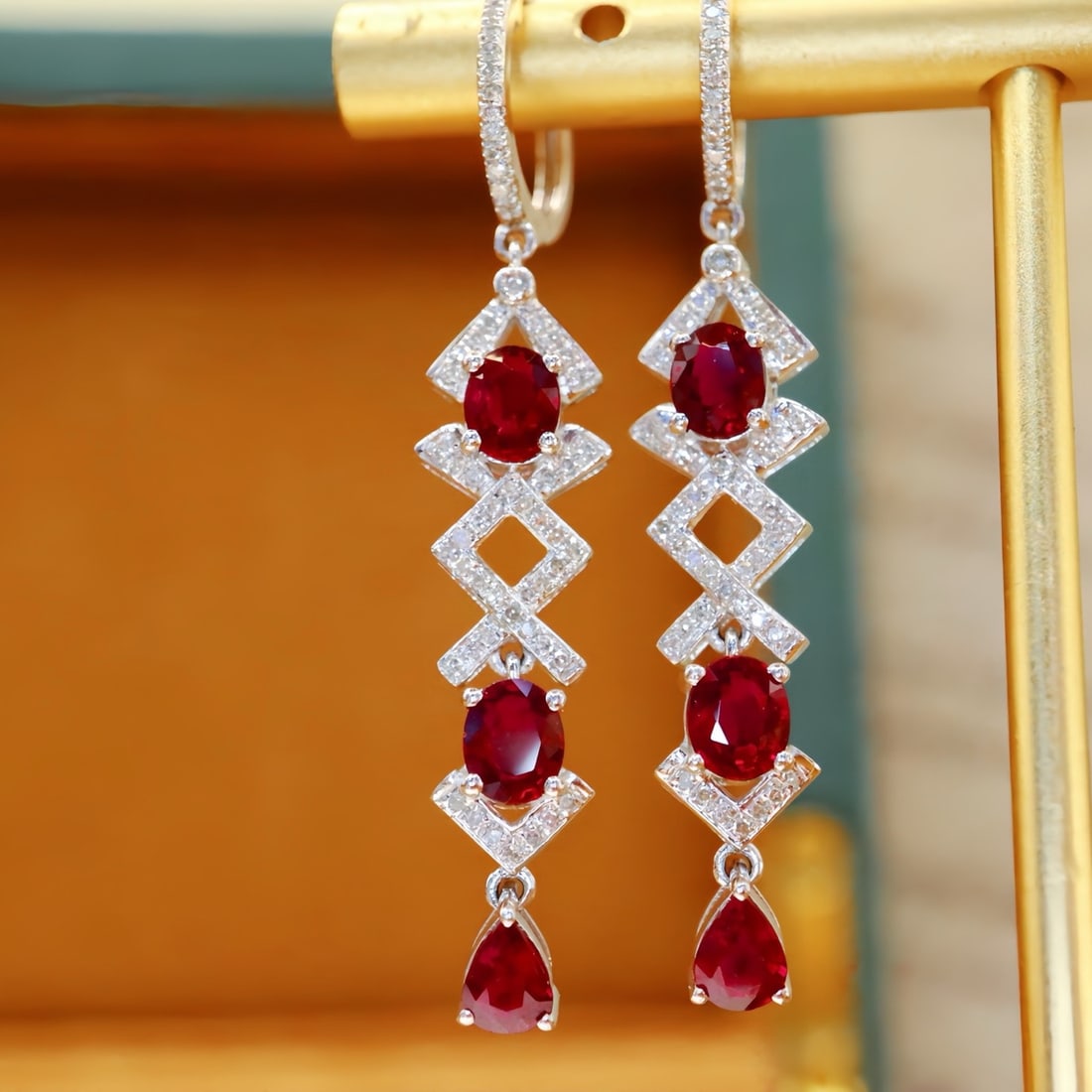 14k Gold 2.70 Ctw Natural Ruby & Diamond Earrings: Ref:231112139 // gold content:14k gold // main gemstone:ruby // shape:multiple // carat weight:2. 35ct // color:pigeonblood red // treatment:natural // // adjacent gemstone 2 : diamond // number of st
