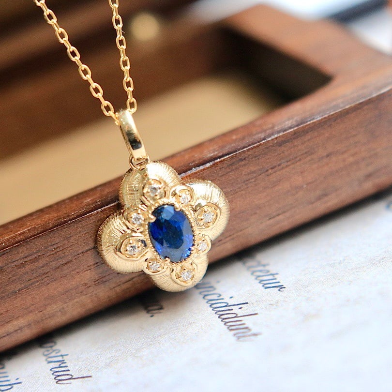 14k Gold 0.6 Ct Natural Sapphire & Diamond Necklace: Ref:231112153 // gold content:14k gold // main gemstone:sapphire // shape:oval // carat weight:0. 6ct // color:blue // treatment:natural // // adjacent gemstone 2 : diamond // shape:round // clarity