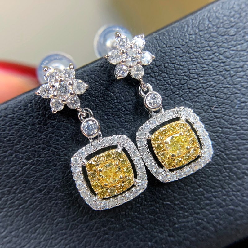 14k Gold 0.90 Ct Natural Color Diamond Earrings: Ref:231112161 // gold content:14k gold // main gemstone:diamond // shape:multiple // carat weight:0. 90ct // clarity grade:vs-si // color:color // treatment:natural // High Estimate: 6600 Low