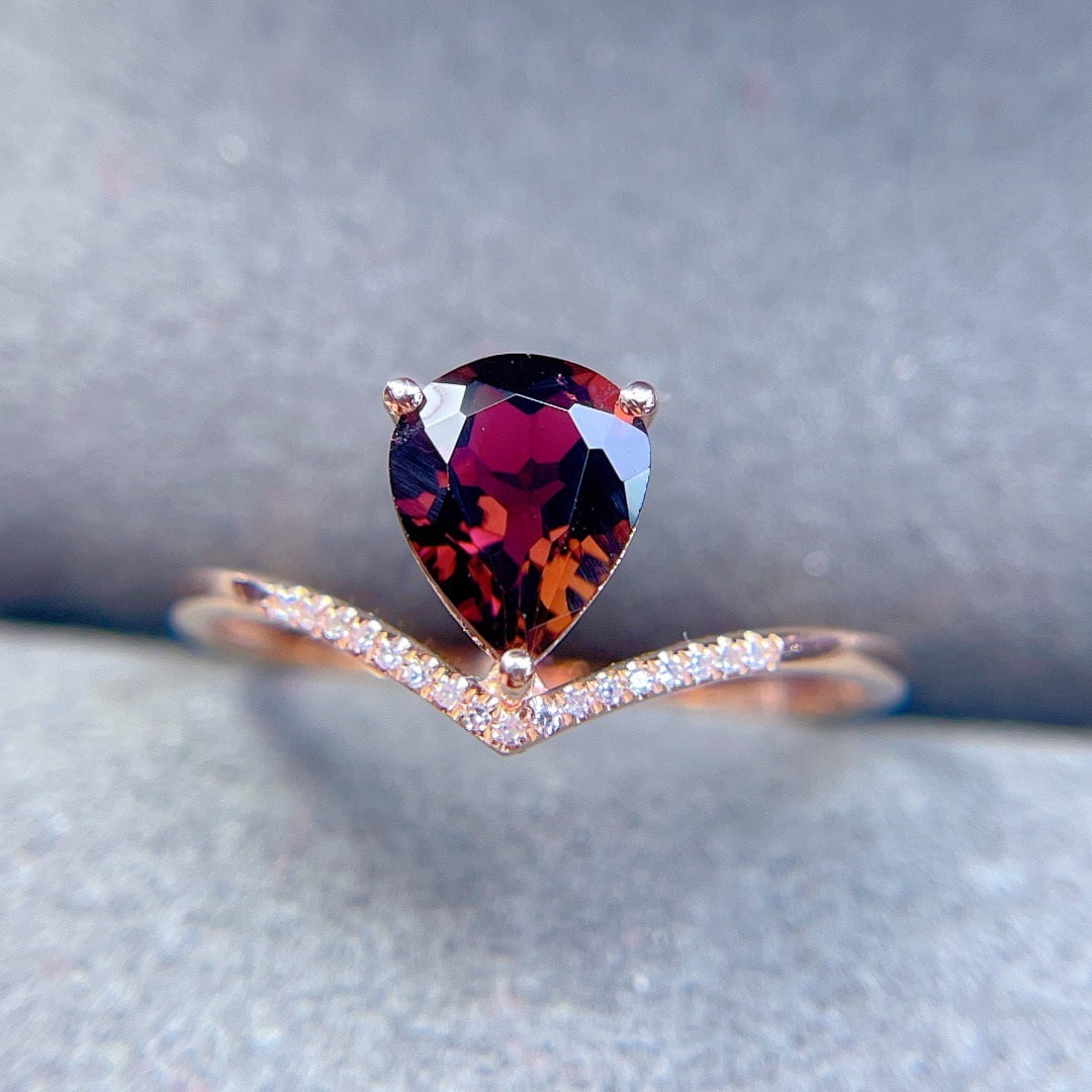 14k Gold 1.35 Ct Natural Tourmaline & Diamond Ring: Ref:231112185 // gold content:14k gold // ring size:7. 25us // // main gemstone:tourmaline // shape:pear // carat weight:1. 35ct // color:red // treatment:natural // // adjacent gemstone 2 : diamond