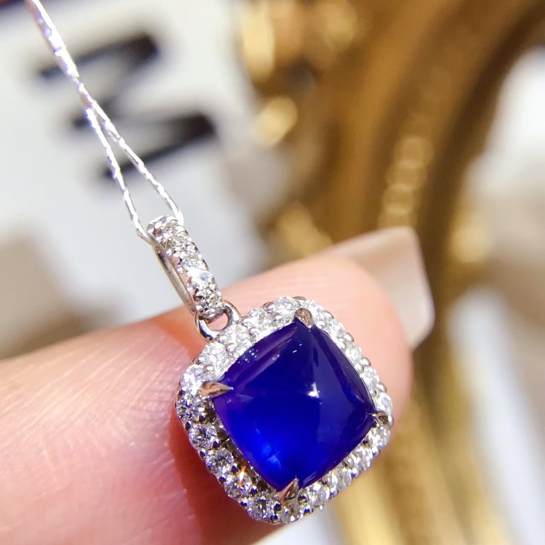 14k Gold 1.70 Ctw Natural Sapphire & Diamond Pendant( Without Chain ): Ref:231112218 // gold content:14k gold // main gemstone:sapphire // shape:sugar-loaf // carat weight:1. 37ct // color:royal blue // treatment:natural // // adjacent gemstone 2 : diamond //
