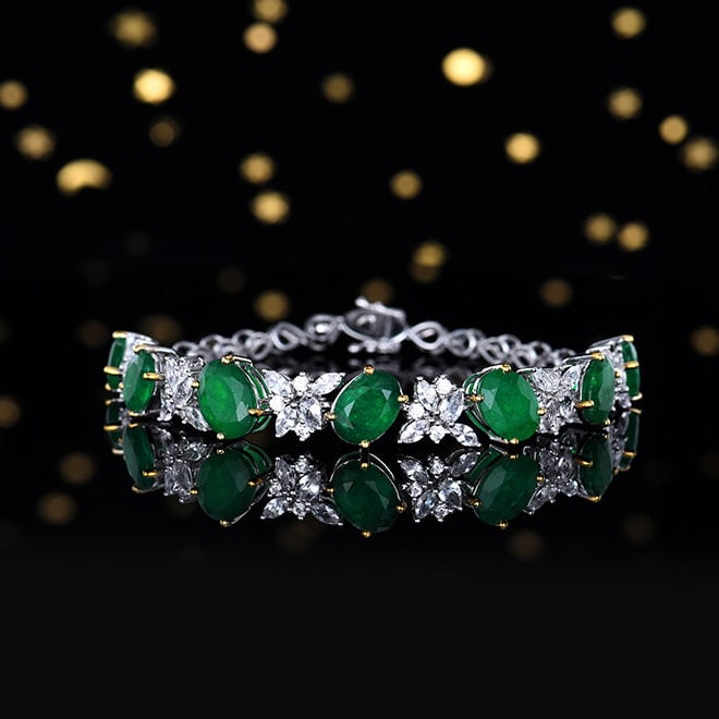 14k Gold 12.13 Ctw Vivid Green Natural Emerald & Sapphire Bracelet: Ref:231112231 // gold content:14k gold // main gemstone:emerald // shape:oval // carat weight:9. 27ct // color:vivid green // treatment:natural // // adjacent gemstone 2 : sapphire // number of