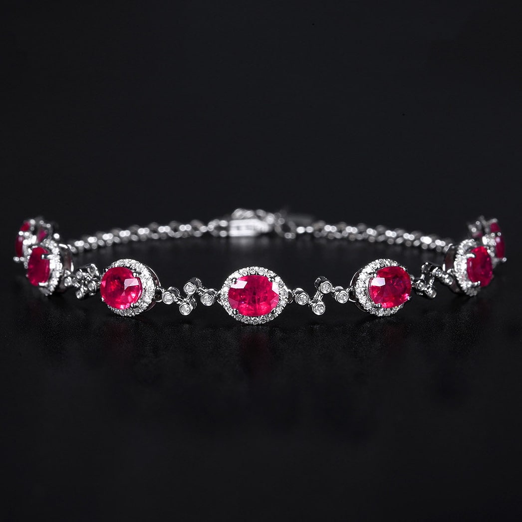 14k Gold 4.16 Ctw Natural Ruby & Diamond Bracelet: Ref:231112232 // gold content:14k gold // main gemstone:ruby // shape:oval // carat weight:3. 62ct // color:red // treatment:natural // // adjacent gemstone 2 : diamond // number of stones:164 //