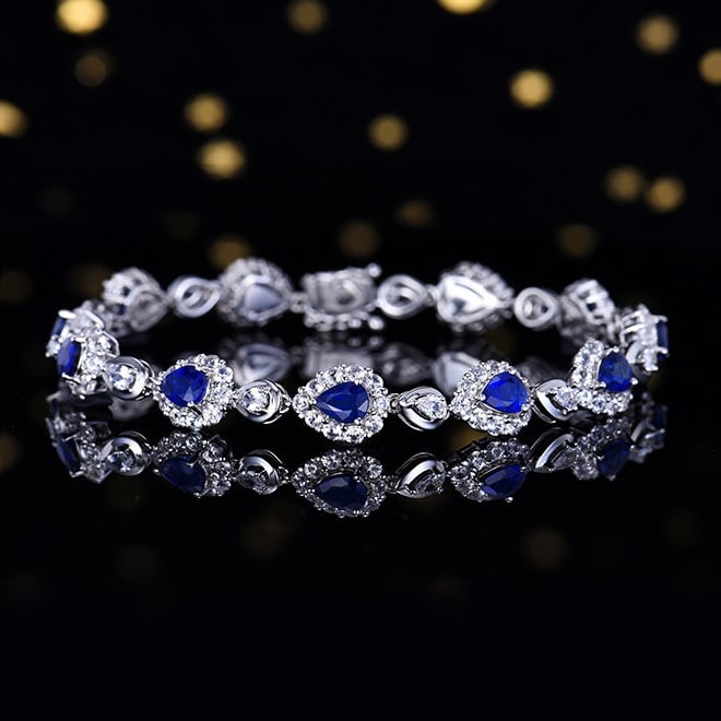 14k Gold 8.41 Ctw Vivid Blue Natural Sapphire & Sapphire Bracelet: Ref:231112242 // gold content:14k gold // main gemstone:sapphire // shape:pear // carat weight:4. 18ct // color:vivid blue // treatment:natural // // adjacent gemstone 2 : sapphire // number of