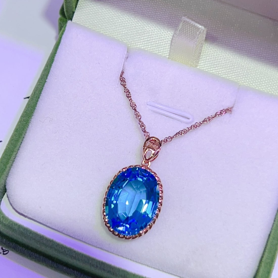 14k Gold 12.9 Ct Natural Topaz Pendant( Without Chain ): Ref:231112304 // gold content:14k gold // main gemstone:topaz // shape:oval // carat weight:12. 9ct // color:blue // treatment:natural // High Estimate: 3000 Condition: New Low Estimate: 2000