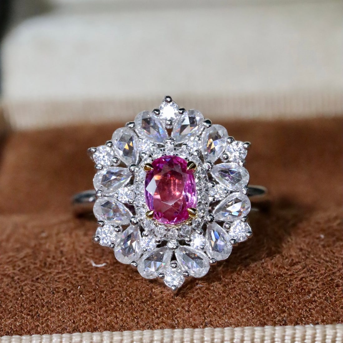 14k Gold 0.78 Ctw Natural Padparadscha Sapphire & Diamond Ring: Ref:231112324 // gold content:14k gold // ring size:7. 25us // // main gemstone:padparadscha sapphire // shape:oval // carat weight:0. 69ct // color:orangish pink // treatment:natural // // adjacent