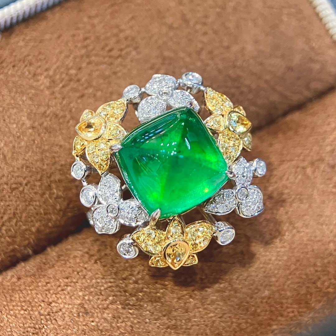 14k Gold 6.65 Ctw Vivid Green Natural Emerald & Diamond Ring: Ref:231112353 // gold content:14k gold // ring size:7. 25us // // main gemstone:emerald // shape:sugar-loaf // carat weight:5. 85ct // color:vivid green // treatment:natural // // adjacent gemstone 2