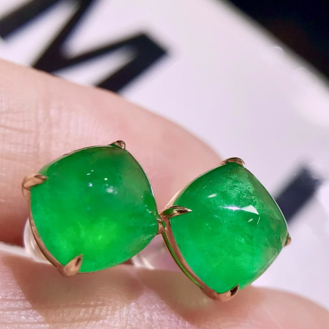 14k Gold 6.4 Ct Natural Emerald Earrings: Ref:231112380 // gold content:14k gold // main gemstone:emerald // shape:sugar-loaf // carat weight:6. 4ct // color:green // treatment:natural // High Estimate: 7900 Condition: New Low Estimate: 5300
