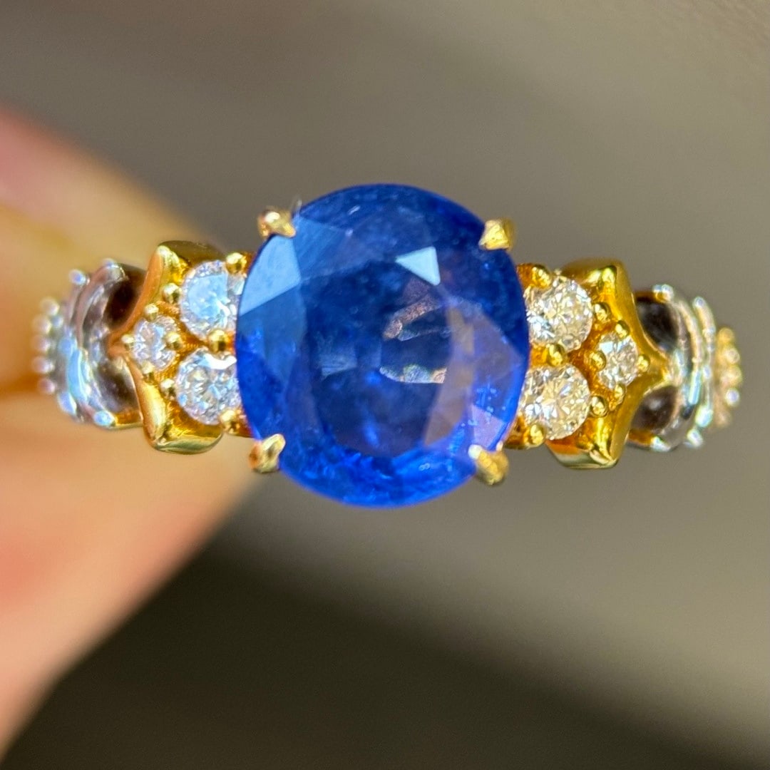 14k Gold 2.27 Ctw Natural Sapphire & Diamond Ring: Ref:231112395 // gold content:14k gold // ring size:7. 25us // // main gemstone:sapphire // shape:oval // carat weight:2. 09ct // color:blue // treatment:natural // // adjacent gemstone 2 : diamond //
