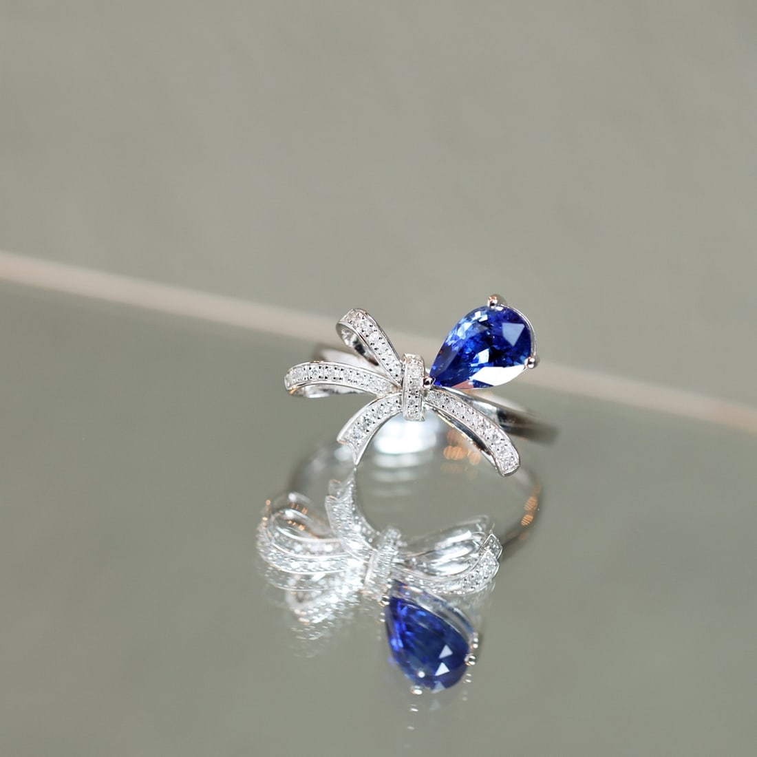 14k Gold 1.47 Ctw Natural Sapphire & Diamond Ring: Ref:231112425 // gold content:14k gold // ring size:7. 25us // // main gemstone:sapphire // shape:pear // carat weight:1. 32ct // color:blue // treatment:natural // // adjacent gemstone 2 : diamond