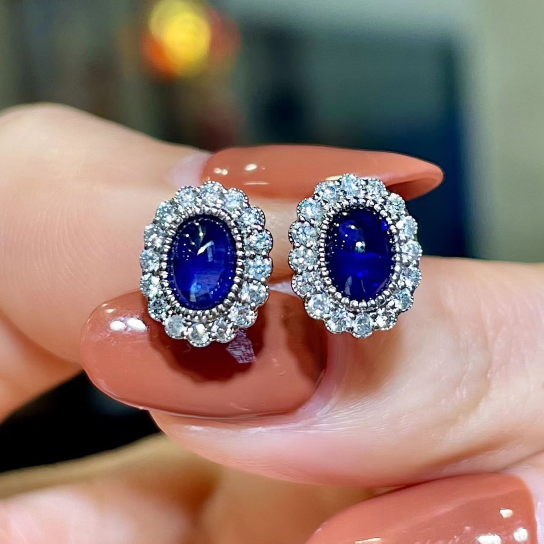 14k Gold 1.53 Ctw Natural Sapphire & Diamond Earrings: Ref:231112430 // gold content:14k gold // main gemstone:sapphire // shape:oval // carat weight:1. 21ct // color:blue // treatment:natural // // adjacent gemstone 2 : diamond // shape:round // carat