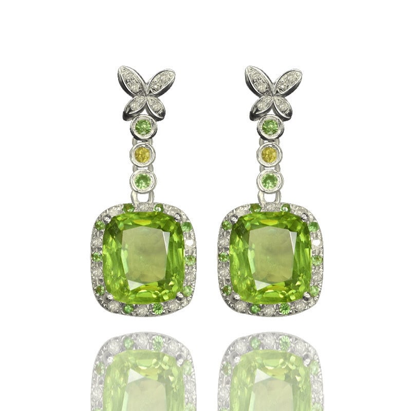 14k Gold 7.05 Ctw Natural Peridot & Diamond Earrings: Ref:231109049 // gold content:14k gold // main gemstone:peridot // shape:cushion // carat weight:6. 86ct // color:green // treatment:natural // // adjacent gemstone 2 : diamond // shape:round //
