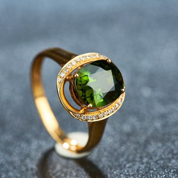 14k Gold 3.2 Ct Natural Tourmaline & Diamond Ring: Ref:231109051 // gold content:14k gold // ring size:7. 25us // // main gemstone:tourmaline // shape:oval // carat weight:3. 2ct // color:green // treatment:natural // // adjacent gemstone 2 : diamond