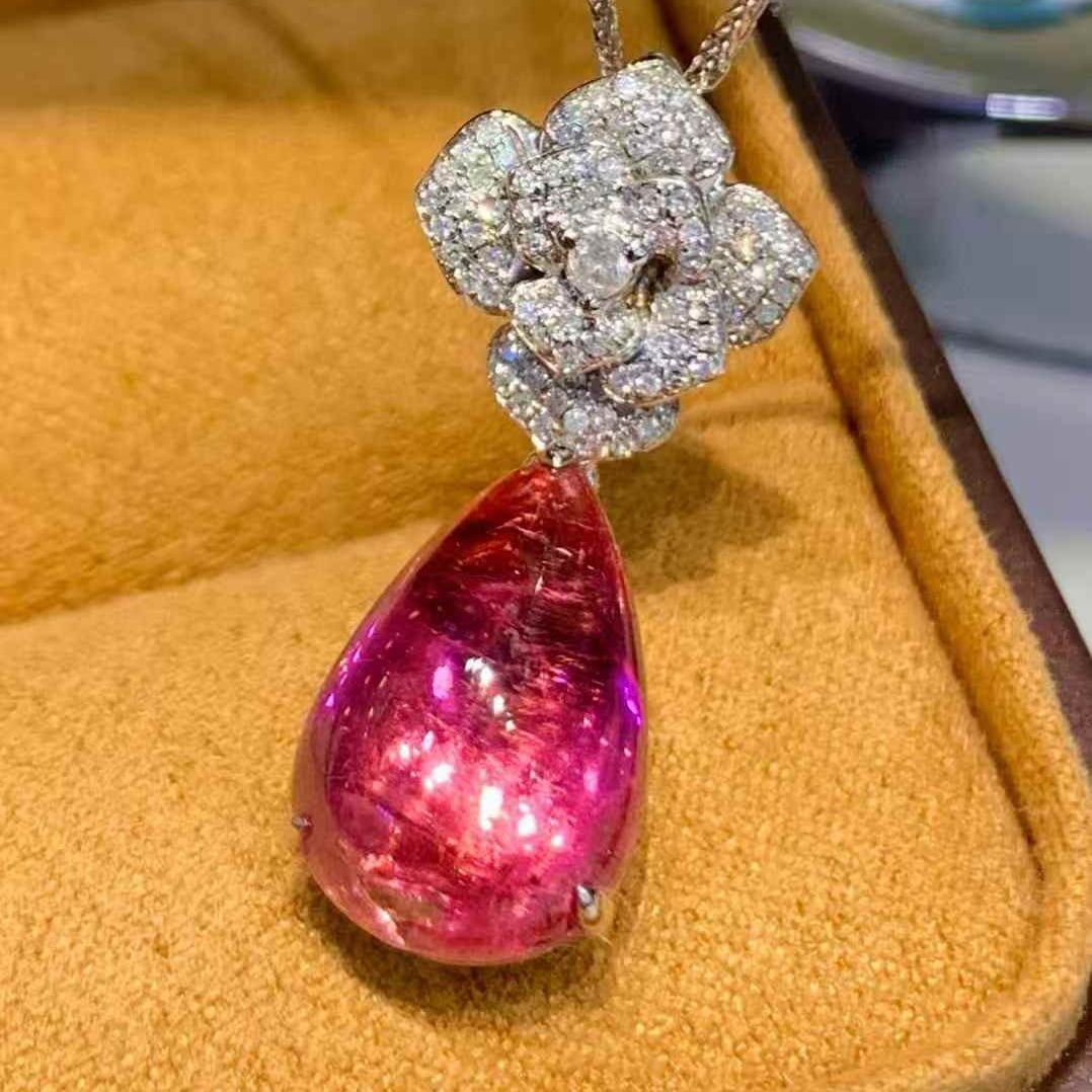 14k Gold 6.8 Ct Natural Tourmaline & Diamond Pendant( Without Chain ): Ref:231109088 // gold content:14k gold // main gemstone:tourmaline // shape:pear // carat weight:6. 8ct // color:red // treatment:natural // // adjacent gemstone 2 : diamond // shape:round // clarity