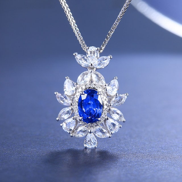 14k Gold 2.57 Ctw Natural Sapphire & Sapphire Pendant( Without Chain ): Ref:231109107 // gold content:14k gold // main gemstone:sapphire // shape:oval // carat weight:1. 12ct // color:blue // treatment:natural // // adjacent gemstone 2 : sapphire // number of stones:16